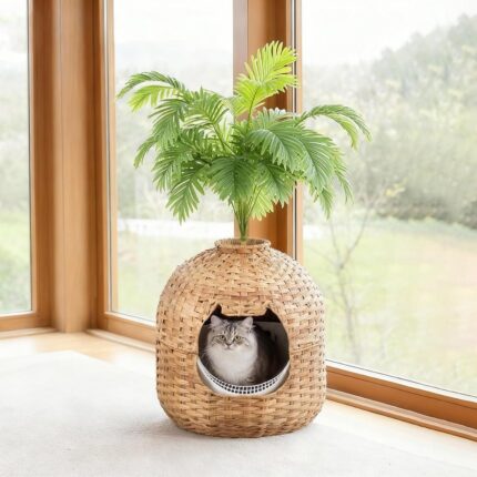 Woven-style litter box with decorative plant